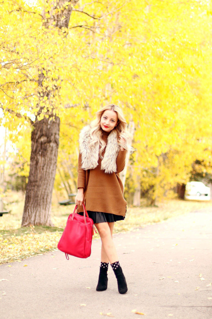 Alena Gidenko of modaprints.com styling a faux leather pleated skirt 