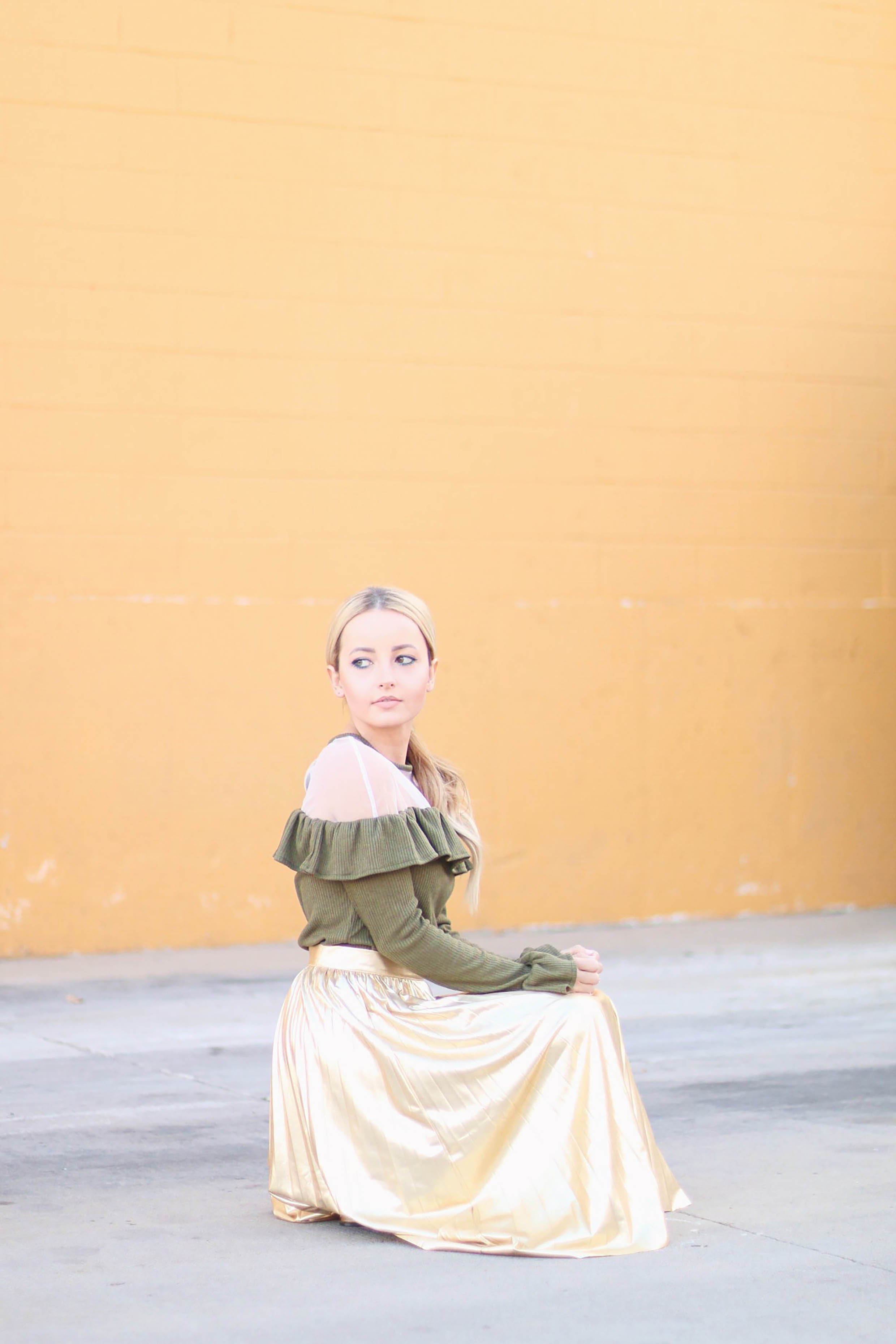 Alena Gidenko of modaprints.com Styling a gold pleated skirt for the holidays