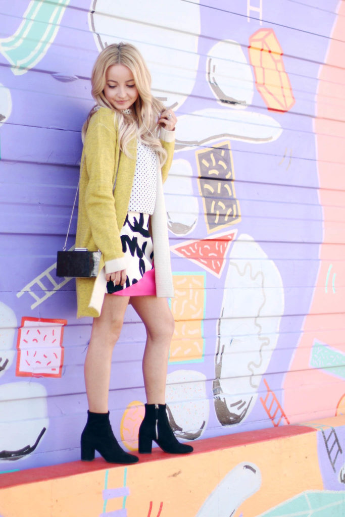Fashion blogger Modaprints styling a yellow cardigan for fall in Denver