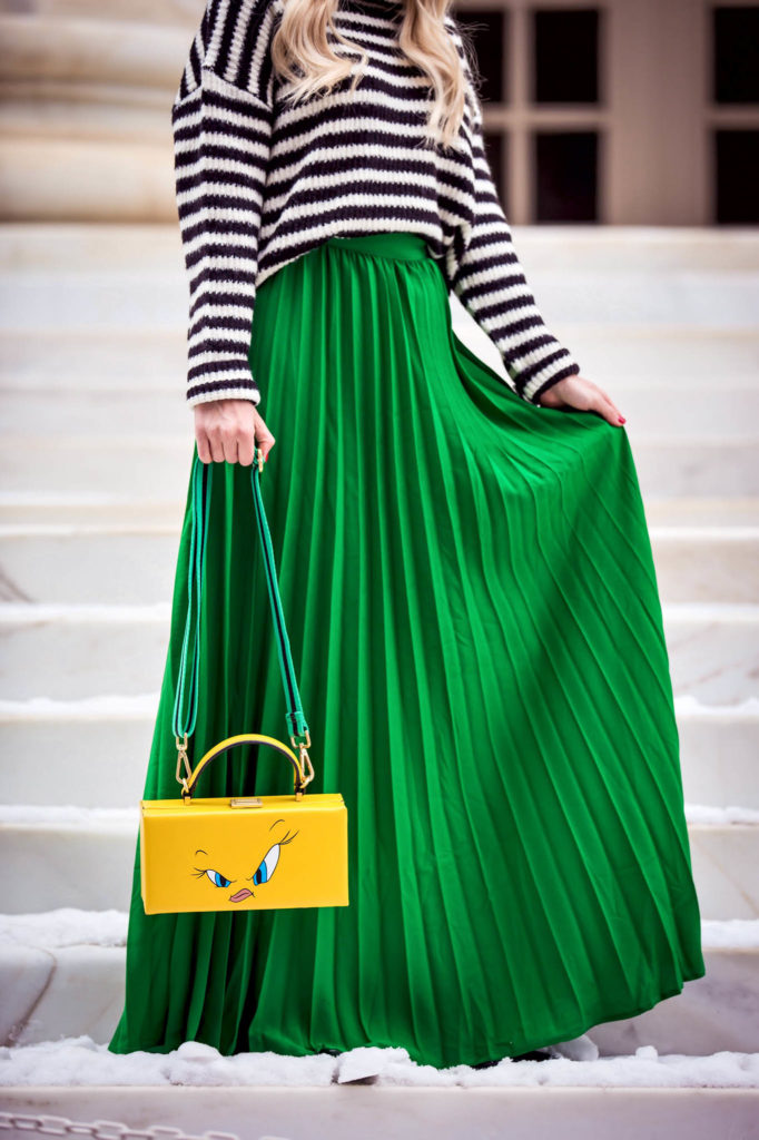 Alena Gidenko of modaprints.com styling a green pleated maxi skirt