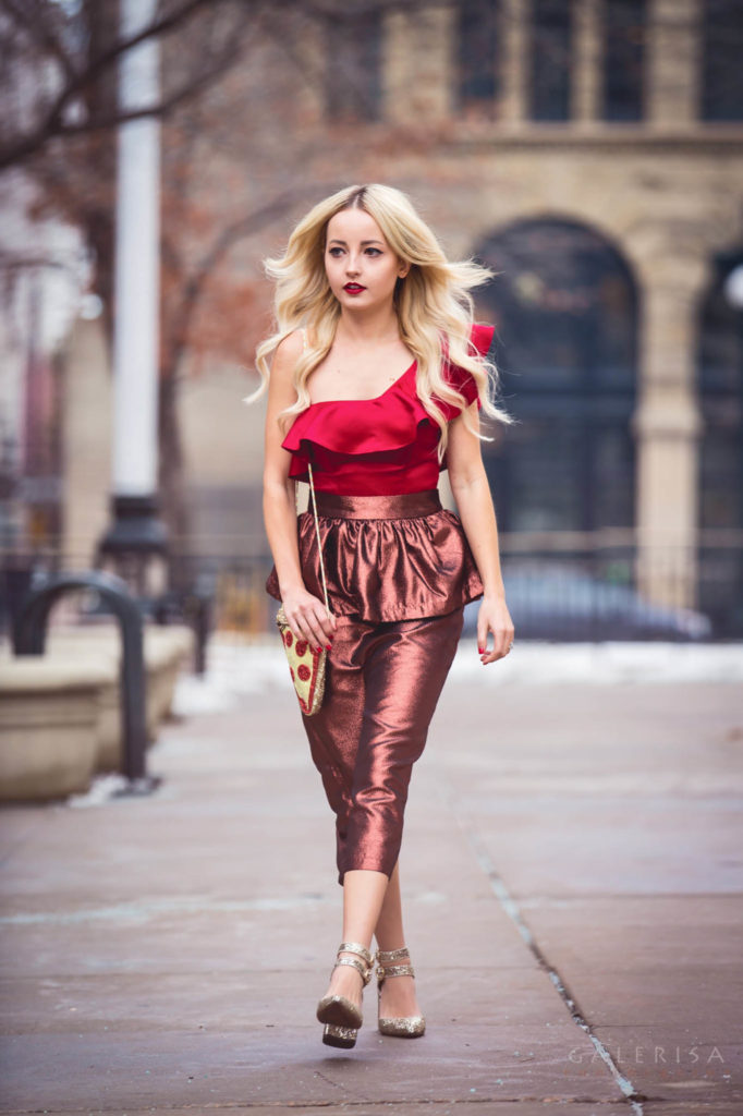 Alena Gidenko of modaprints.com styling a ruffled top and skirt with sparkle heels for the holidays 
