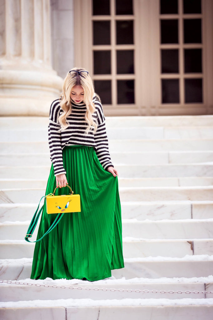 Alena Gidenko of modaprints.com styling a green pleated maxi skirt
