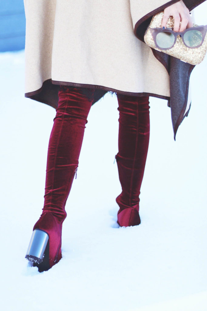 Alena Gidenko of modaprints.com styling over the knee burgundy boots