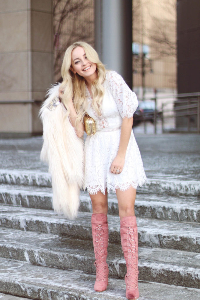 Alena Gidenko of modaprints.com styles a white lace romper for a Valentines dinner