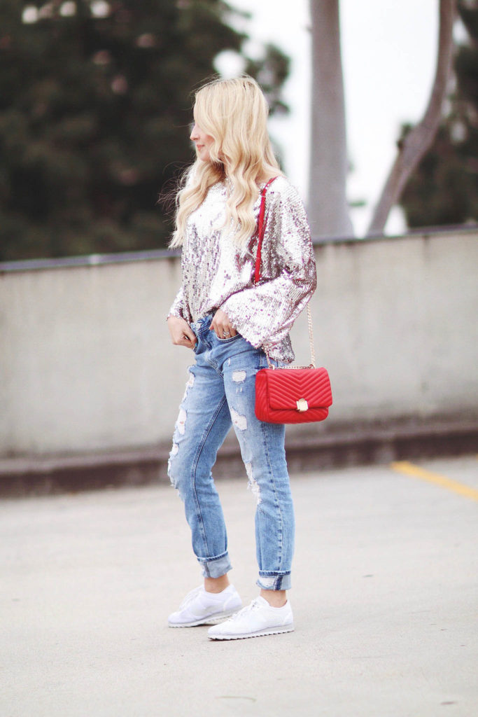 Alena Gidenko of modaprints.com is sharing tips on how to wear a sequin top dressed down 