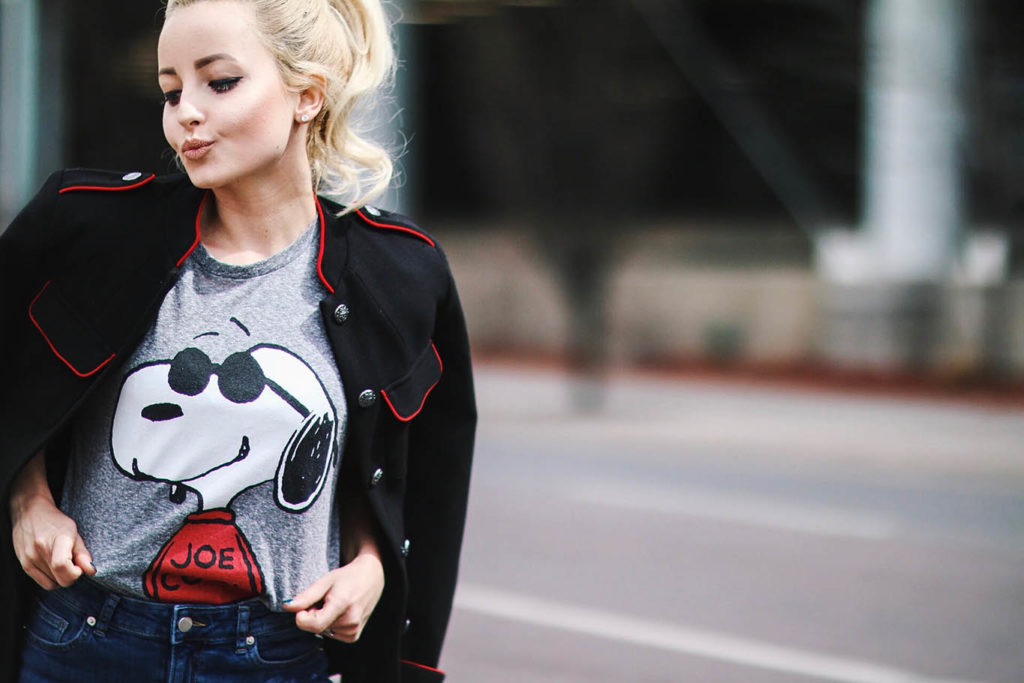 Alena Gidenko of modaprints.com styles a Snoopy tee shirt with boyfriend jeans and red studded heels
