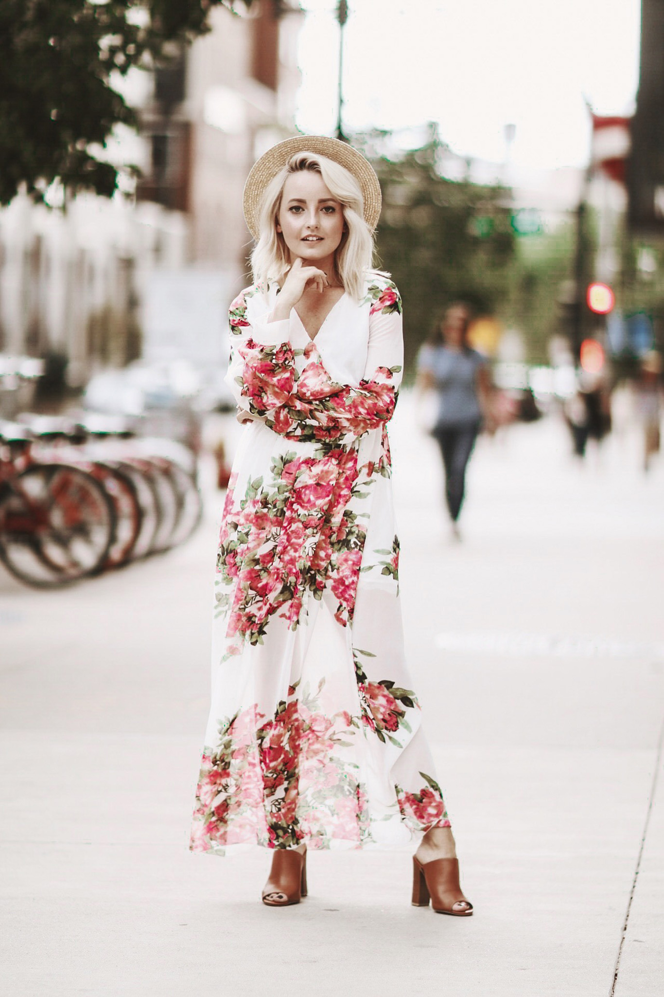 Alena Gidenko of modaprints.com styles a floral maxi dress for Fall with brown open toe mules