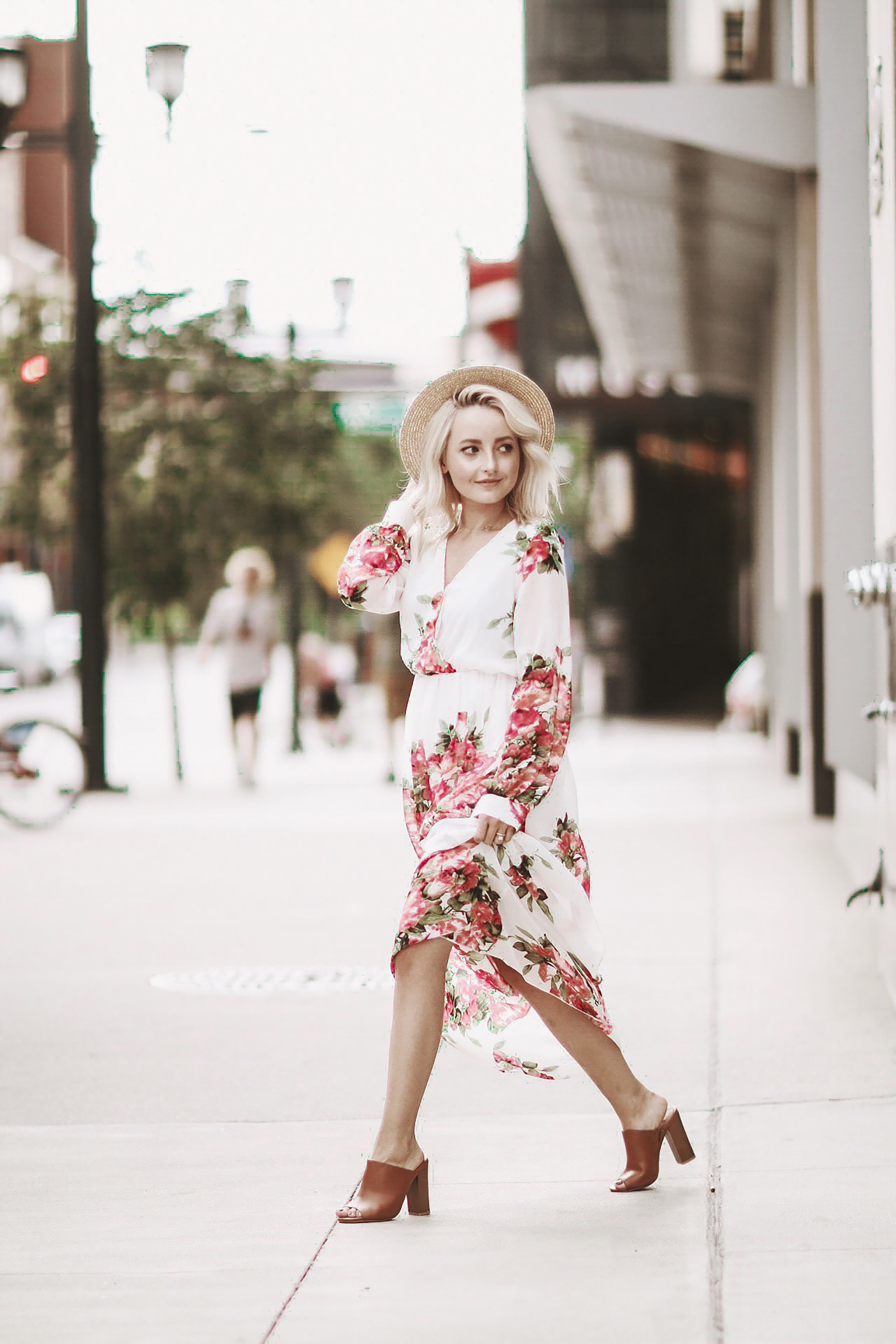 Alena Gidenko of modaprints.com styles a floral maxi dress for Fall with brown open toe mules