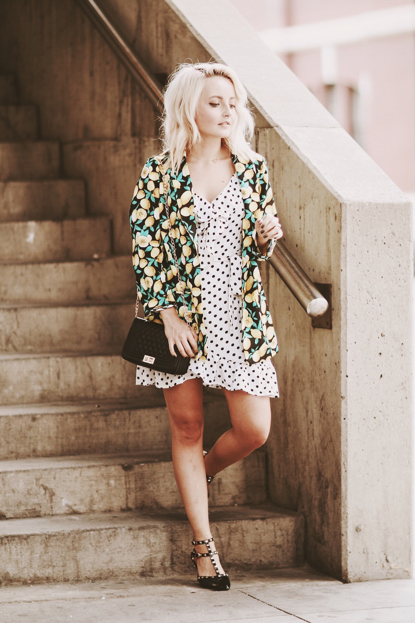 Alena Gidenko of modaprints.com styles her Summer polka dot dress with a lemon blazer for Fall