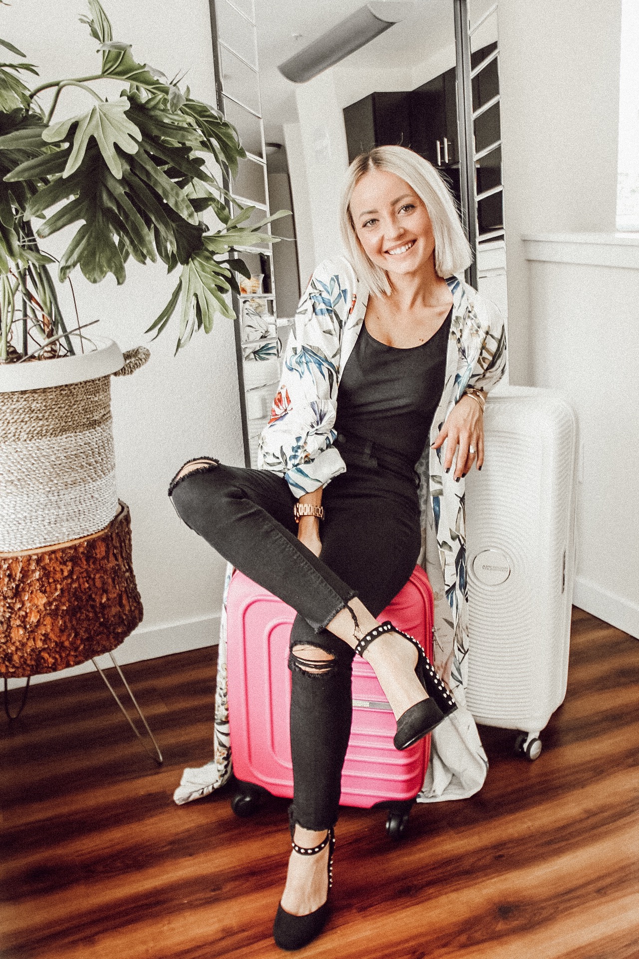 Alena Gidenko of modaprints.com shares tips on how to stay organized and pack for a trip with American Tourist suitcase