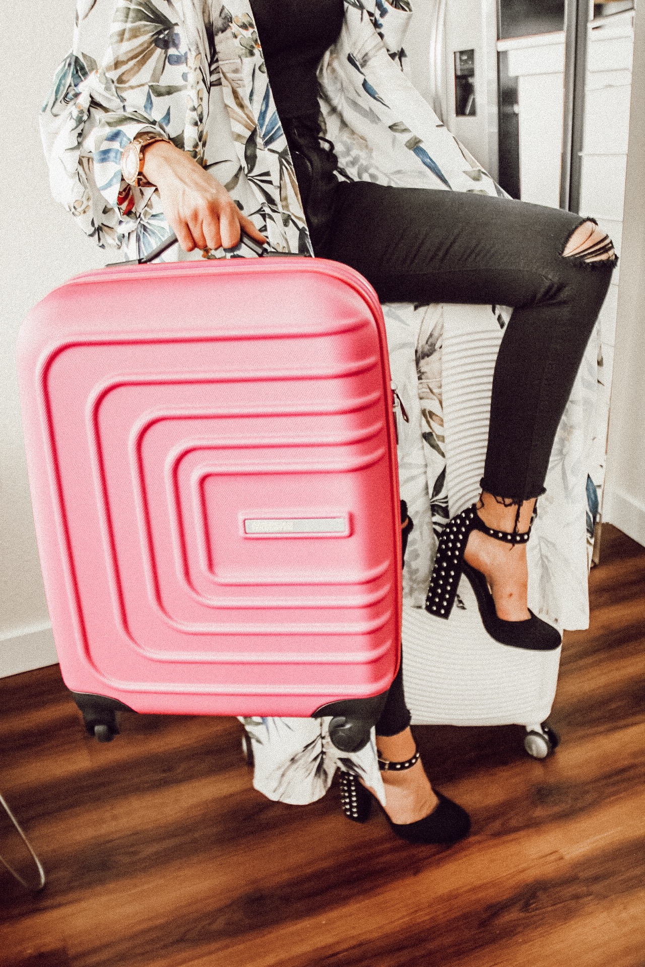Alena Gidenko of modaprints.com shares tips on how to stay organized and pack for a trip with American Tourist suitcase